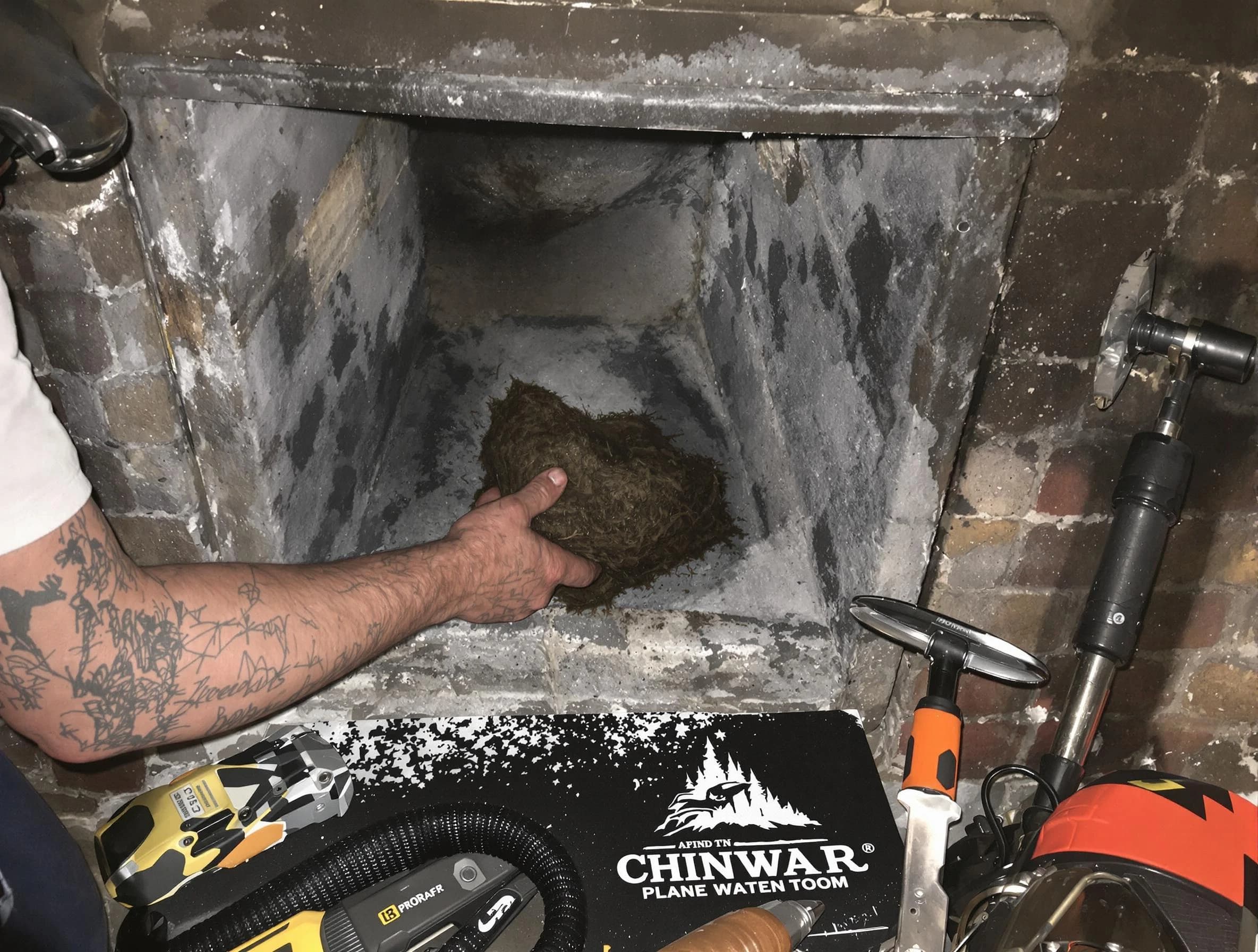 Hampton Chimney Sweep safely removing debris and screening chimney in Hampton, PA